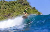 Indonesia, Bali, woman surfing